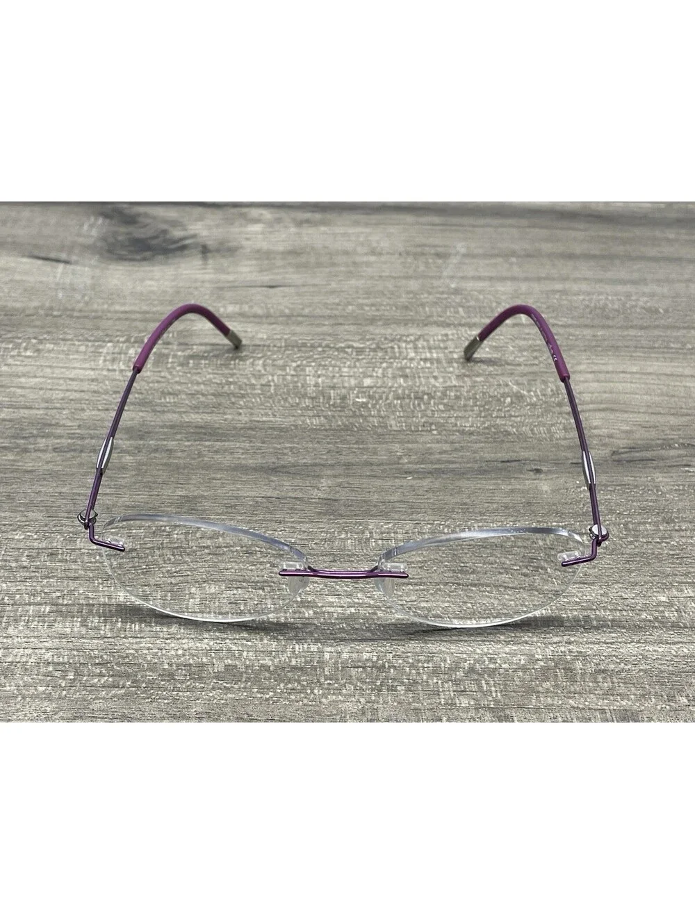 SILHOUETTE 5521 FE 4040 Purple Oval Rimless Eyeglasses 48[]17-135 FRAMES ONLY